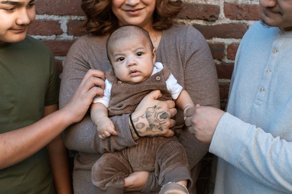 woman carrying a baby
